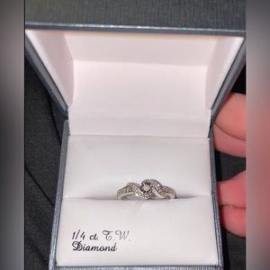 1/4 CtTw 14K White Gold over Sterling Silver size 7 ring. New in the box.